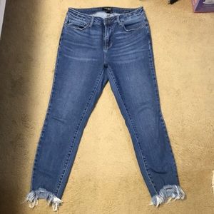 Shark bite skinny jeans